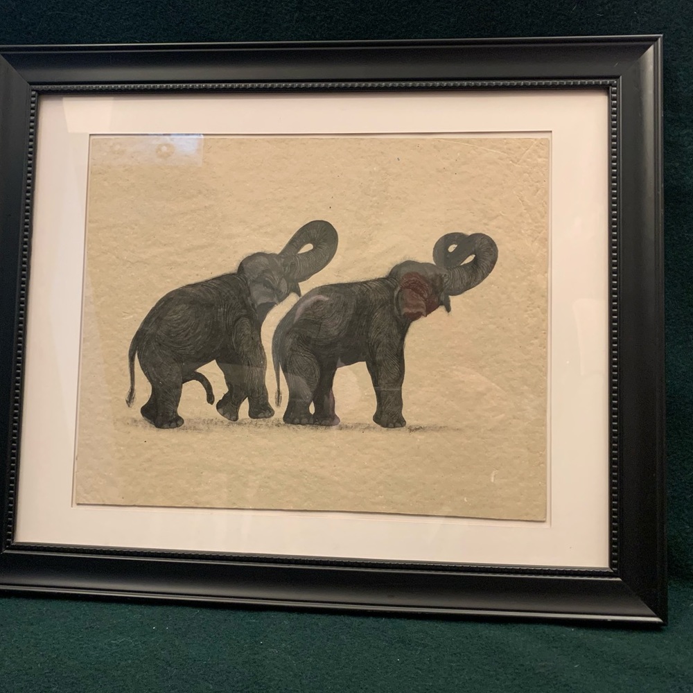 Elephant in black frame, signed by Thashara
